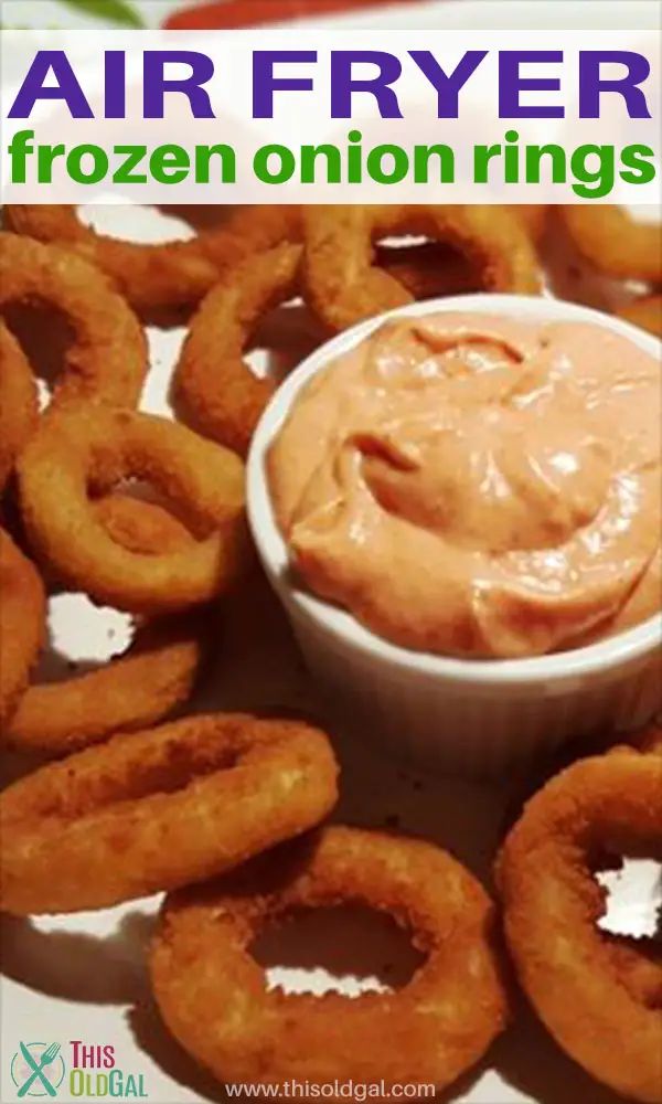 there are onion rings and dip in the bowl on this plate with text overlay