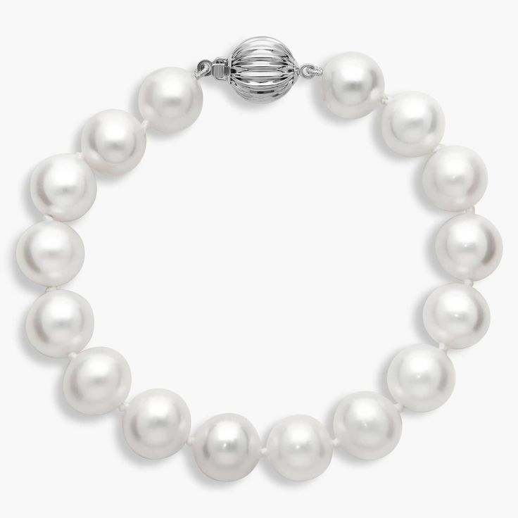 Add a timelessly sophisticated touch to your style with this simple yet classic bracelet of softly gleaming 9-10mm freshwater pearls. The white gold design promises enduring quality and luxury. Formal Pearl White Bracelet With Pearl Chain, Formal Pearl White Pearl Bracelet With Pearl Chain, Formal Pearl White Pearl Chain Bracelet, Luxury Pearl Drop Bracelet For Formal Occasions, Elegant Pearl Bracelet For Formal Occasions, Elegant Formal Pearl Chain Bracelet, Luxury Akoya Pearl Bracelet For Formal Occasions, Luxury Pearl Drop Bracelets For Formal Occasions, Formal Single Strand Pearl Bracelet With Round Beads