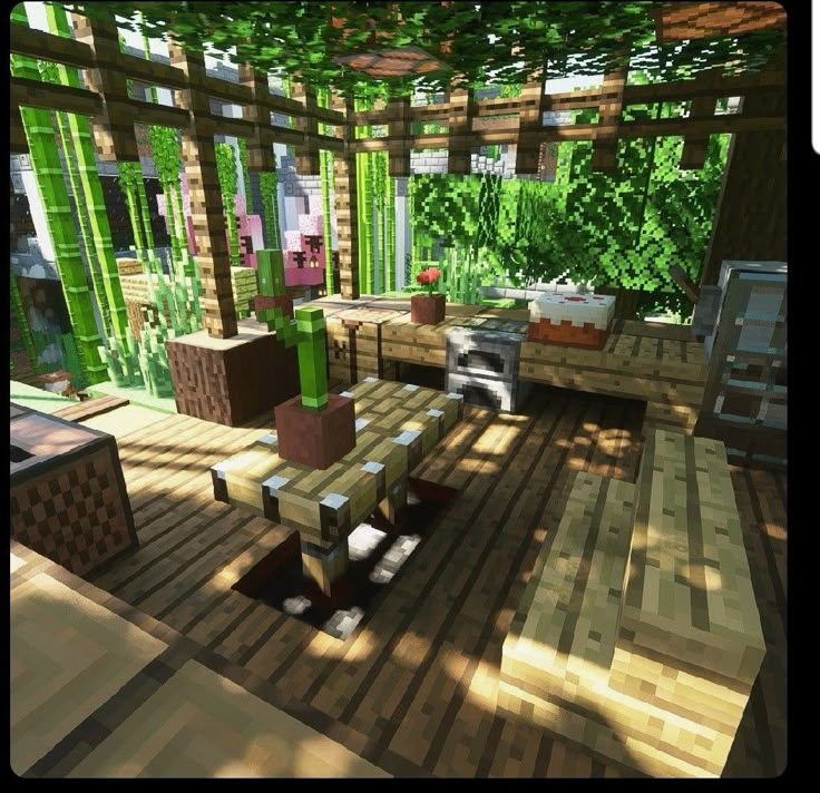 a room filled with lots of furniture and green plants on top of wooden flooring