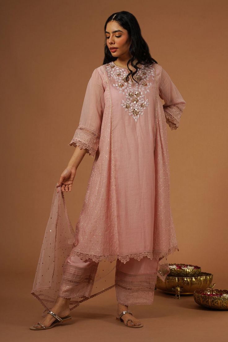 Pink brocade panelled kalidaar kurta with floral, thread and mukaish hand embroidery. Paired with pant and dupatta.
Components: 3
Pattern: Embroidered
Type Of Work: Floral
Neckline: Notched v neck
Sleeve Type: Three quarter
Fabric: Silk Chanderi
Color: Pink
Other Details: 
Lace detailing
Floral embroidery
Occasion: Mehendi and Haldi - Aza Fashions Kalidaar Kurta, Pink Brocade, Kurta Set For Women, Fashion App, Fabric Silk, Indian Designer Wear, Kurta Set, Modern Bride, Pink Silk