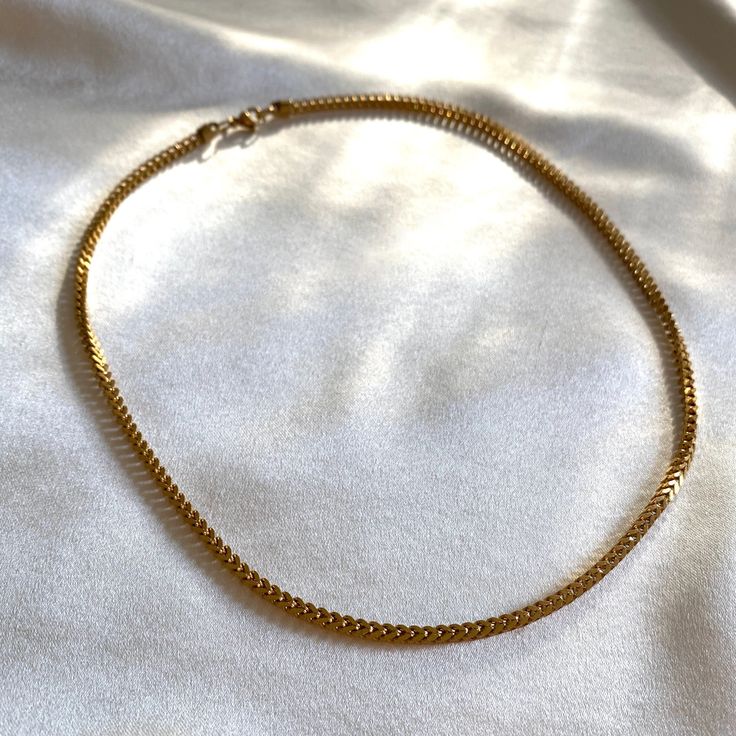 A classic chain with an edge — a square edge to be exact. Worn on its own or layered with others, this is the unique style your dainty collection is longing for. As this necklace is 18K gold plated stainless steel, it has to be looked after for you to enjoy it for a longer period of time. Here are a few tips to help care for your necklace;• Keep away from waterAvoid showering, saunas / steam rooms, swimming, sleeping and exercising in this necklace.• StorageKeep this necklace stored in the origi Classic Jewelry With Adjustable Chain And Square Pendant, Everyday Minimalist Necklace With Curb Chain, Classic Jewelry With Curb Chain And Rectangular Links, Minimalist Necklace With Curb Chain For Gifts, Minimalist Curb Chain Necklace As Gift, Timeless Everyday Snake Chain Jewelry, Minimalist Curb Chain Necklace, Minimalist Everyday Curb Chain Necklace, Everyday Jewelry With Delicate Square Pendant Chain