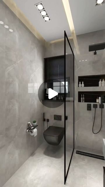 a bathroom with a toilet, shower and sink in it's center wall is shown