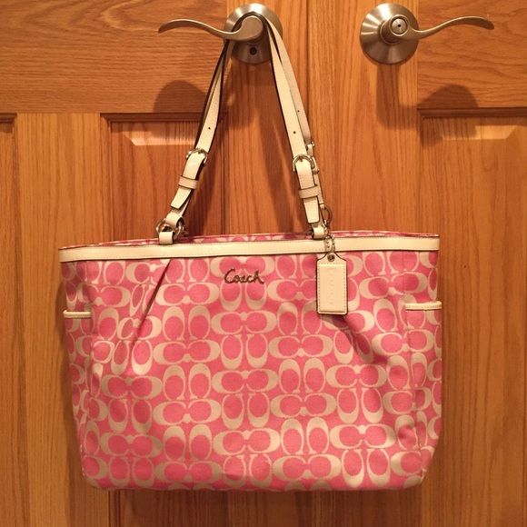 NWOT Coach Signature Bag NWOT Coach Signature Print bag. Never been used -- in excellent condition. Approx size is 14.5"L x 5"W x 10.5"H Coach Bags Pink Bag With Removable Pouch For On-the-go, Pink Shoulder Bag With Dust Bag For Travel, Pink Bag With Top Carry Handle For Errands, Pink Satchel For Everyday, Pink Rectangular Diaper Bag For On-the-go, Pink Satchel Shoulder Bag With Top Carry Handle, Pink Double Handle Satchel For Travel, Pink Tote Bag With Top Carry Handle, Pink Tote Shoulder Bag With Dust Bag