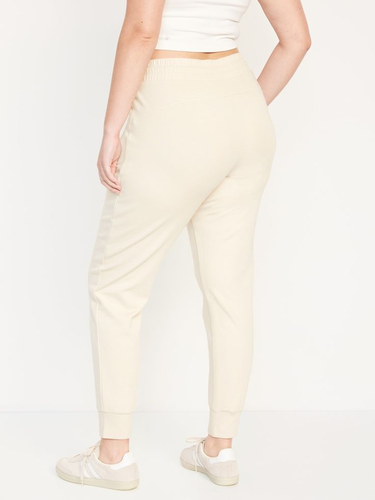 elastic-drawstring waist faux fly zippered hip pockets cuffed leg sits at belly button semi-fitted hip and thigh slim leg 27 1/2" regular inseam 25 1/2" petite inseam 30 1/2" tall inseam models are approx.  5'9" and wear sizes s (4), l (12), and xl (18) Comfortable Pull-on Leisure Bottoms, Relaxed Fit Sweatpants With Elastic Waistband And Cuffed Ankles, Athleisure Bottoms With Comfort Stretch, Mid-rise Sweatpants With Pockets For Loungewear, Sporty Relaxed Fit Pull-on Bottoms, Elevated Casual Full-length Sweatpants With Elastic Waistband, Full Length Sweatpants For Elevated Casual Look, Athleisure Full Length Bottoms With Comfort Waistband, Full Length Athleisure Bottoms With Comfort Waistband