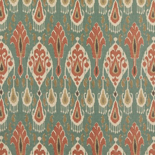 an orange and green pattern on fabric