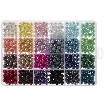 various colors of beads in a plastic container