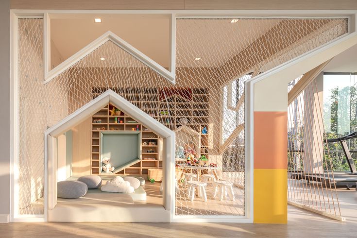 the inside of a house that is made out of bookshelves