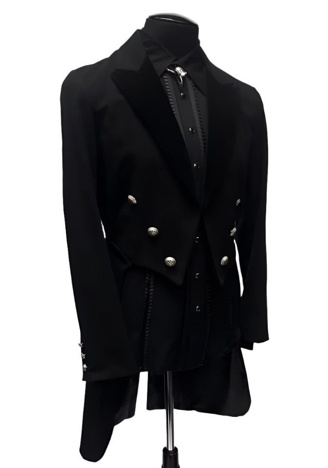 A formal Victorian coat with tails. Great for special occasions, formal events, or when you want to stand out from the crowd. Heavy brushed black denim fabric with luxurious black velvet lapels. Fully lined in rich black satin. Six ornate metal buttons decorate the front and two at the waist in back. Three smaller metal buttons are at each cuff. Comes in sizes Small-3X. I love this one!! Measurements: Small - Chest 40" Waist 30-34" Medium - 42-44" Waist 32-38" Large - Chest 46" Waist 36-40" XL - Black Blazer For Black-tie Events In Winter, Luxury Black Tuxedo For Fall, Black Suits For Black-tie Events In Fall, Black Tuxedo For Fall, Tailored Black Tuxedo For Fall, Black Notch Lapel Tuxedo For Fall, Gothic Black Outerwear For Formal Occasions, Tailored Black Outerwear For Black-tie Events, Tailored Black Tuxedo For Winter