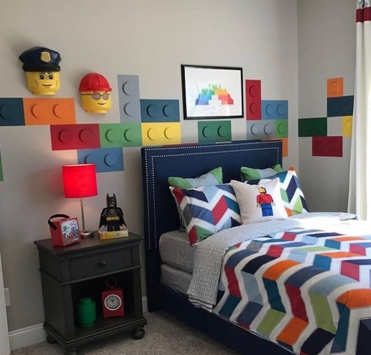 a child's bedroom decorated in lego blocks