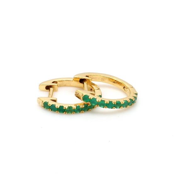 Carv Jewels presents an extraordinary 14K Solid Gold Hoop Earring Studded WithGreen Onyx all over. This breathtaking Earring flaunting with Real naturalGreenOnyx , crafted from 14K Solid Gold for a classic and timeless look. This uniquejewelry will make you look elegant, fit all-occasions, is a must-have piece inyour jewelry collection. Due to the design, they may fit differently on everyperson. They are meant for lobes and may be a large fit for cartilage. Hoopsarereally dainty and that means t Green 14k Gold Hoop Earrings, Elegant Green Huggie Jewelry, Green Huggie Earrings For May Birthstone, Elegant Green Hoop Huggie Earrings, Elegant Green Huggie Hoop Earrings, 14k Gold Huggie Earrings With Gemstone, Anniversary Huggie Earrings With May Birthstone, Anniversary Gift May Birthstone Round Huggie Earrings, Green Gemstone Hoop Earrings In Fine Jewelry Style