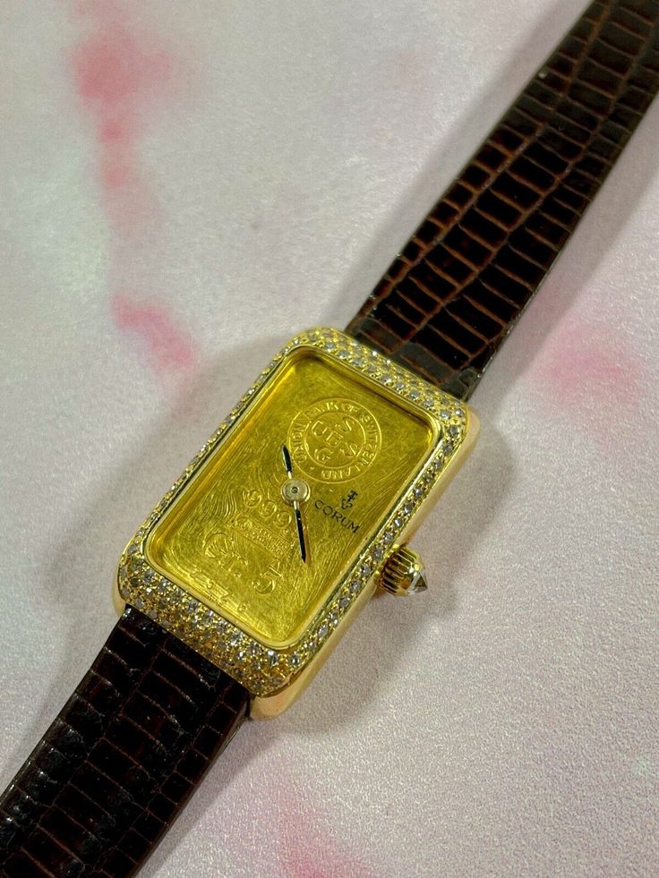 Corum 999.9 18/24k U.B.S. Gold Bar Diamond Mechanical Ladies' Watch | eBay Luxury Gold Diamond Watch For Formal Occasions, Gold Rectangular Diamond Watch For Business, Luxury Yellow Gold Jewelry With Rectangular Dial, Designer Gold Diamond Watch, Gold Engraved Diamond Watch For Formal Occasions, Luxury Engraved Yellow Gold Watches, Luxury Gold Watch Accessories For Formal Occasions, Luxury Gold Watch Accessories For Formal Events, Luxury Gold Watches For Formal Occasions