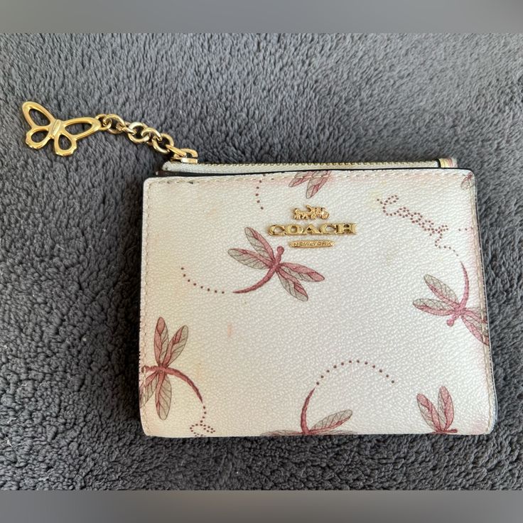 This Coach Wallet Is The Perfect Size To Fit In Your Back Pocket When You Want To Condense To “Just The Essentials”. Some Steaming From Denim, But Otherwise In Perfect Condition! Coach Wallet With Zipper Pouch As Gift, Coach Coin Purse With Zipper Closure As Gift, Everyday White Coin Purse With Zipper Closure, Coach Wallets With Zipper Closure, Coach Wallets With Zipper Closure For Everyday Use, Coach Coin Purse With Zipper For Everyday Use, Cream Wallets With Zipper Closure For Daily Use, White Bifold Wallet With Zipper, Coach White Wallet With Zipper Pouch