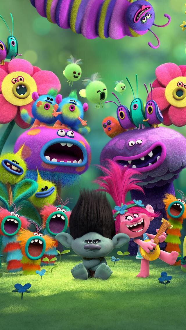 the movie poster for les trolls with many colorful monsters and flowers in the background