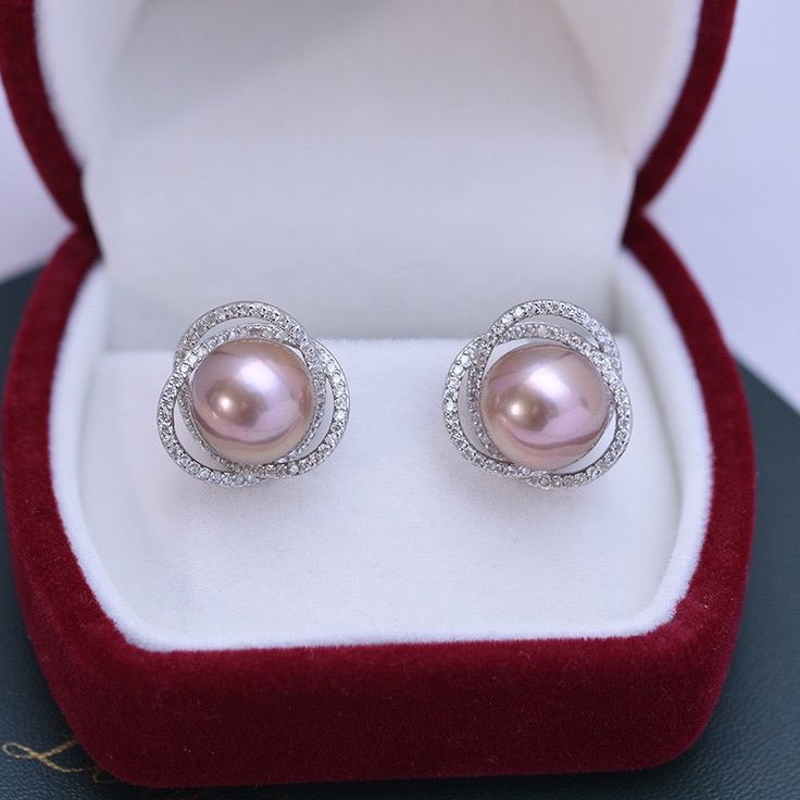 11-12mm Freshwater Pearl Earrings Treat yourself to timeless elegance with these 11-12mm Freshwater Pearl & Rose Floral Earrings from House of Pearls. Classically crafted from freshwater pearls, these earrings exude a classic charm that never goes out of style. The soft, rosy hue of the pearls gives them an added sense of allure, while the simple design keeps them versatile enough to wear it with almost any outfit. Perfect for casual or formal occasions, these timeless studs will add a hint of l Aaa Quality Pearl Earrings For Wedding, Aaa Quality Round Pearl Earrings For Wedding, Formal Rose Gold Pearl Earrings With Elegant Design, Elegant Pink Pearl Earrings For Formal Occasions, Pink Pearl Earrings For Formal Occasions, Aaa Quality Exquisite Pearl Earrings For Wedding, Rose Gold Pearl Earrings For Anniversary, Exquisite Aaa Quality Pearl Earrings For Wedding, Round Akoya Pearl Bridal Earrings As Gift