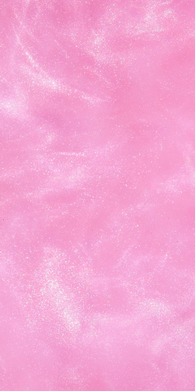 a pink background with lots of white speckles