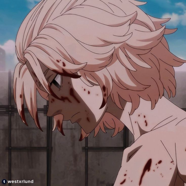 a man with white hair and blood on his face looking at something in the air