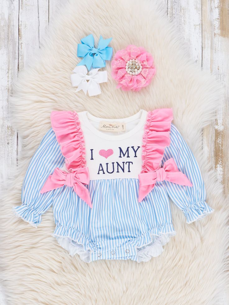 Show the world some family love in this adorable ruffle bubble! With a sweet "I ❤️ Mom" slogan, your little will charm everyone he meets. And with coordinating sibling sets, your family will be the most stylish crew around. Get ready for some serious cuteness overload! Snap buttons. Fits true to size. 95% Polyester / 5% Spandex 97% Cotton / 3% Spandex Accessories sold separately. Import. Lydia is 15 lbs and 25 inches long wearing size 3-6 months. *Afterpay & Sezzle Purchase Requires $35 Minimum Order. Family Love, Cuteness Overload, Blue Stripes, 6 Months, Bubbles, Rompers