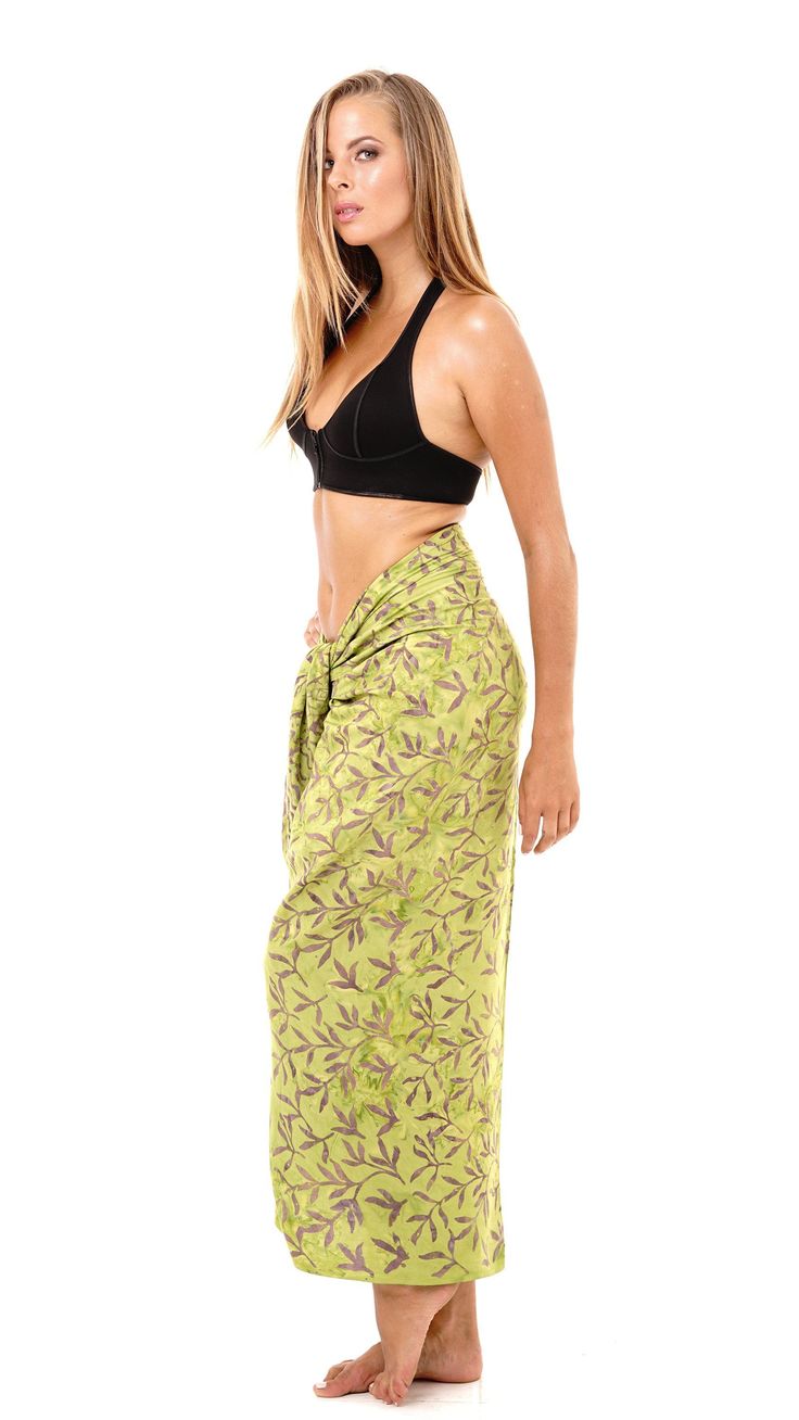 Bamboo print sarong. Perfect to enhance your beach vacation. Wear as a halter dress, headpiece, scarf, or even use as a beach blanket. Don't limit your imagination. Lightweight fabric Bamboo Print Made of soft breathable rayon material Soak in cold water before wearing Green Beachy Sarong For Poolside, Bohemian Sarong For Swimming Vacation, Bohemian Sarong For Swimming And Vacation, Green Bohemian Wrap Sarong, Green Wrap Sarong For The Beach, Hawaiian Printed Sarong For Poolside, Green Beach-style Sarong For Beach, Hawaiian Printed Sarong For Beach Cover-up, Green Hawaiian Sarong For Vacation