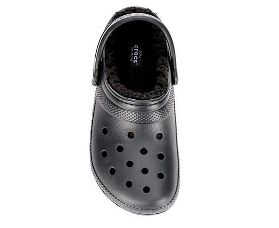 Crocs Classic Lined Men's/Womens Clog Enjoy even more coziness with the Crocs Classic Lined unisex Clog. A soft, fuzzy liner updates the classic Croc to wrap your foot in cradling comfort that's blissfully supportive. Perfect for running errands or chilling around the house. Synthetic upper Slip-On w/heel strapSoft liningDual Crocs Comfort footbedTraction outsole Comfortable Winter Clogs With Textured Footbed, Comfortable Clogs With Textured Footbed For Winter, Winter Outdoor Clogs With Textured Footbed, Indoor Winter Clogs Made Of Synthetic Material, Synthetic Clogs For Indoor Use In Winter, Indoor Synthetic Clogs For Winter, Casual Winter Outdoor Clogs, Winter Non-slip Synthetic Clogs, Casual Synthetic Clogs For Winter