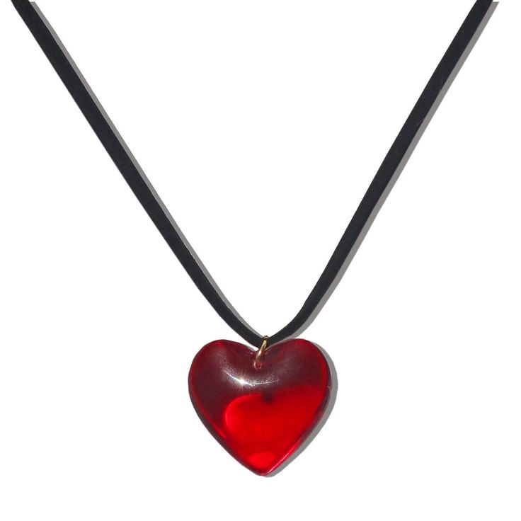 Visit our website at www.ShopGeminiJewels.com for better prices and latest products. Large red glass heart pendant on a black suede leather chain. As seen on Olivia Rodrigo during her GUTS world tour. Measurements - Chain length: ~15" inches with a 2" inch extension chain (17" inches total) - Charm measurements: ~25 x 28 mm Materials - Chain material: Suede Leather - Charm material: Glass - Nickel & lead free Delicately handmade Necklace length reference: - 14" in: Fits like a choker - 16" in: H Red Glass Heart Necklace, Red Heart Choker, Red Heart Pendant Necklace, Heart Necklace Red, Red Heart Pendant, Red Pendant Necklace, Glass Heart Necklace, Red Heart Necklace, Necklace With Heart