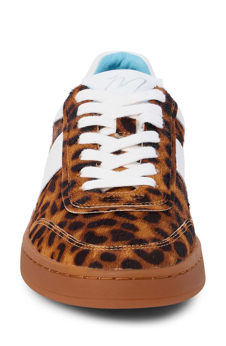 Mixed textures and a padded collar create a retro aesthetic on a low-profile sneaker grounded by a classic cupsole. 1" heel Lace-up style Leather or genuine calf-hair upper/leather lining/synthetic sole Imported Leopard Sneakers, Retro Aesthetic, Calf Hair, Up Styles, Retro Inspired, One Pic, Low Top, Style Guides, Top Sneakers