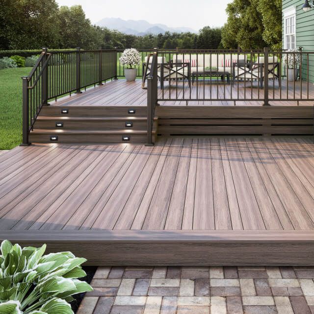 a wooden deck with steps leading up to it