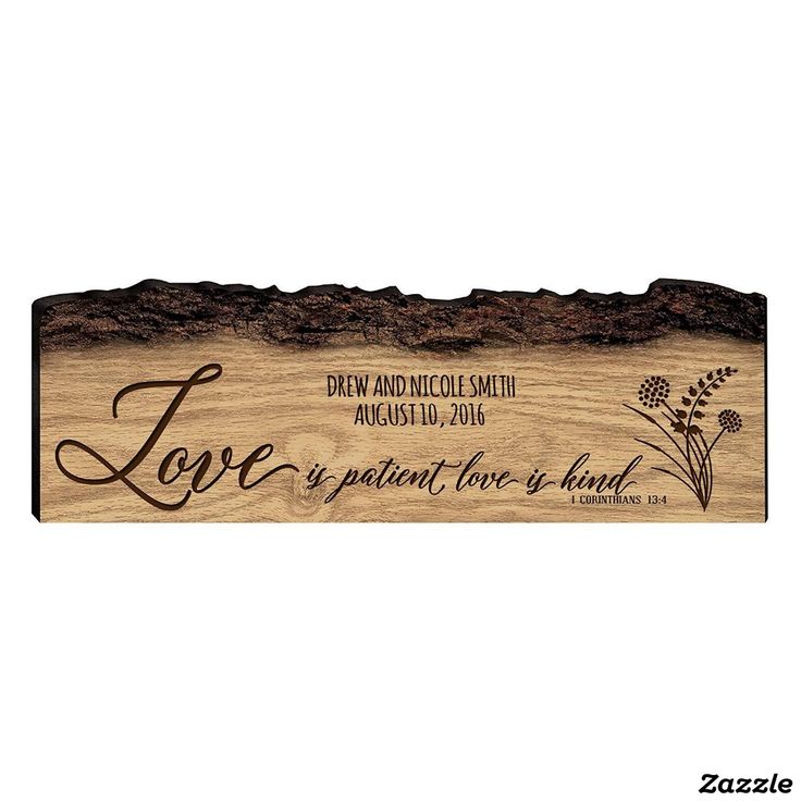 a wooden sign that says love is patient for a kind of friend with flowers on it