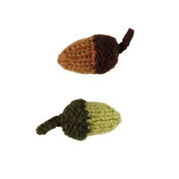 three crocheted items are shown in the shape of an acorn and turtle