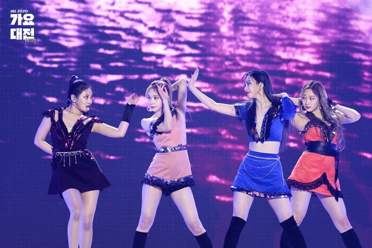 girls'generation performing on stage at an event