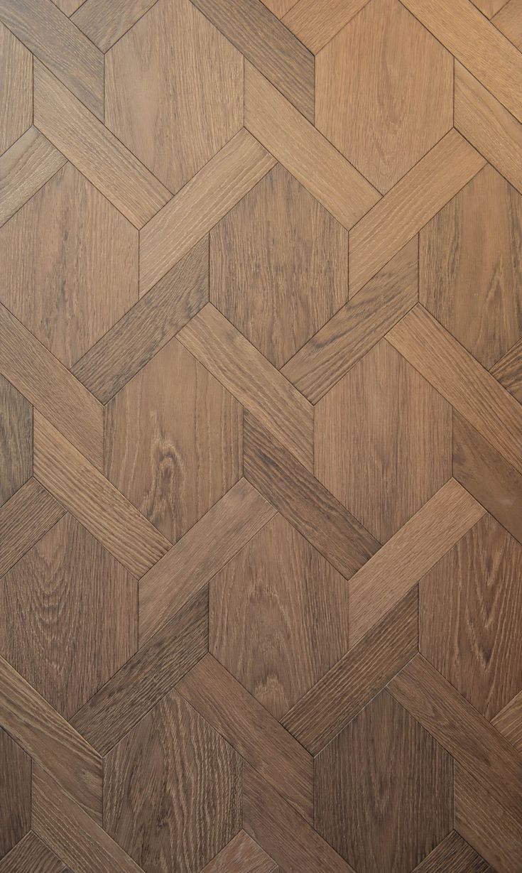 an image of wood flooring that looks like hexagonal tiles or herringbones