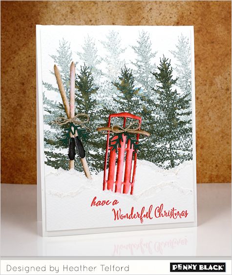 a handmade christmas card with two skis and poles in front of snow covered pine trees