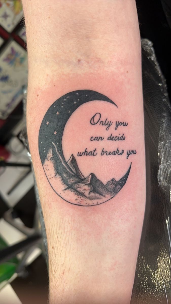 a person with a tattoo on their arm that says only you can decide what breaks you