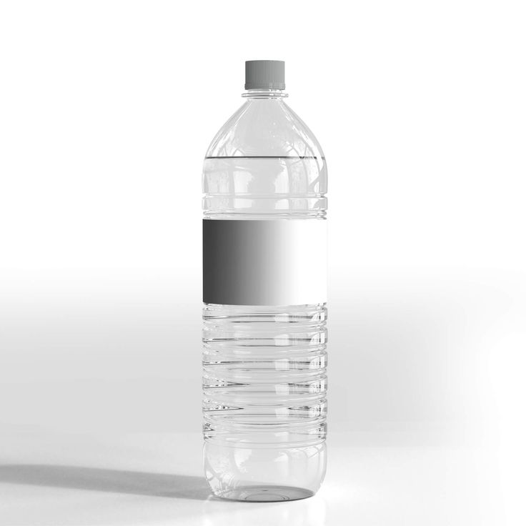 a bottle of water on a white surface with a black spot in the top half