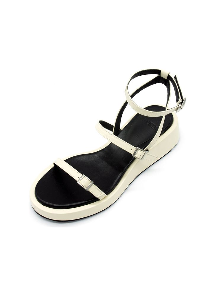 Editor's NoteBuckle strap platform sandals will complete your summer outfit- Simple strappy sandals- Designed with chic almond toe- Adjustable ankle strap to find the most comfortable fit- Contrast color insole- Perfect for summerMeasurement (inch)- KR220(US 5)-KR255(US 8.5)- Height 1.4in.* Fits true to the size* Please refer to the size chartComposition & Care- Cow Skin (Cream) + Lamb Skin (Black)* Deformation or discoloration might happen if in contact with humid air or high temperature* A Modern T-strap Sandals With Heel Strap For Summer, Modern Sandals With Heel Loop For Summer, Modern Summer Sandals With Heel Loop, Modern Ankle Strap Sandals For Summer, Summer Platform Footbed Sandals With Ankle Strap, Modern Wedge Sandals With Ankle Strap For Summer, Modern Ankle Strap Wedge Sandals For Summer, Summer Double Strap Platform Footbed Sandals, Modern Ankle Strap Wedge Sandals For Beach