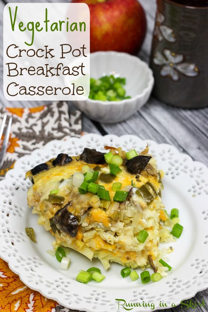 vegetarian crock pot breakfast casserole on a white plate with an apple in the background