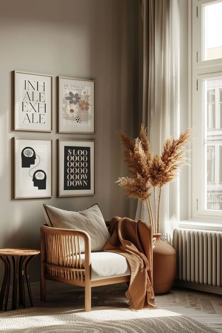 a living room filled with furniture and pictures on the wall next to a radiator