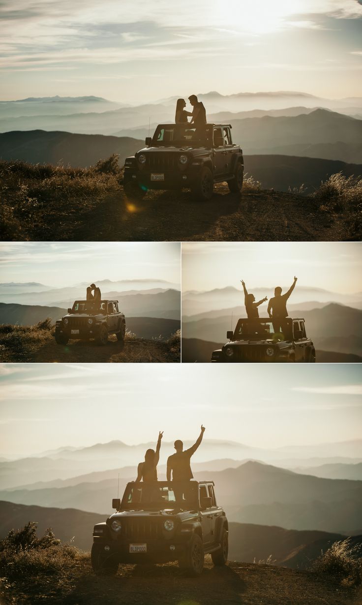 three people are sitting on top of a truck in the mountains with their arms up