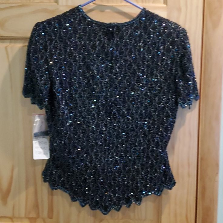 Brand New Navy Blue Sequined Top. Size Small. Purchased At Dress Barn. Extra Sequins In Bag. Blue V-neck Blouse For Evening, Blue Stretch Top For Formal Occasions, Formal Stretch Blue Top, Elegant Blue Blouse For Party, Blue Top For Night Out Party Season, Blue Fitted Blouse For Evening, Elegant Blue Top For Night Out, Elegant Blue Tops For Evening, Elegant Fitted Blue Tops