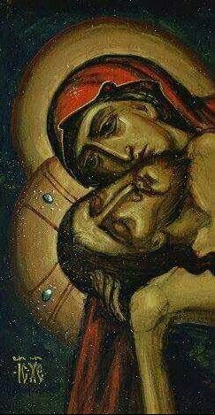 an image of jesus holding the head of another person in his arms and wearing a red cap