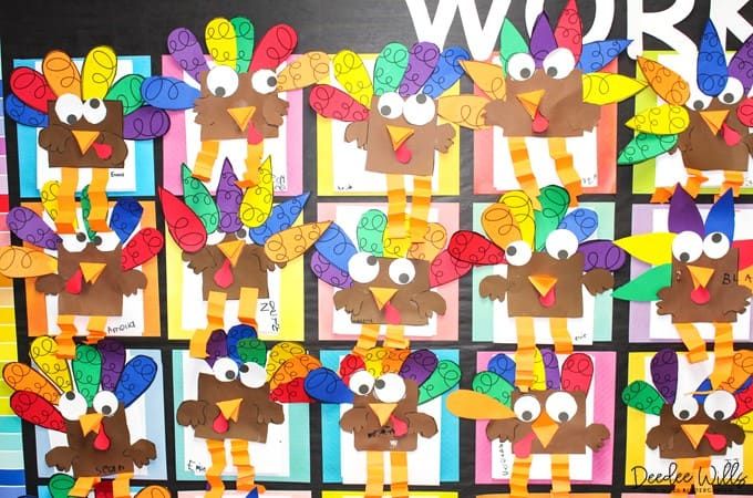 a bulletin board with turkeys on it and the words work written in large letters