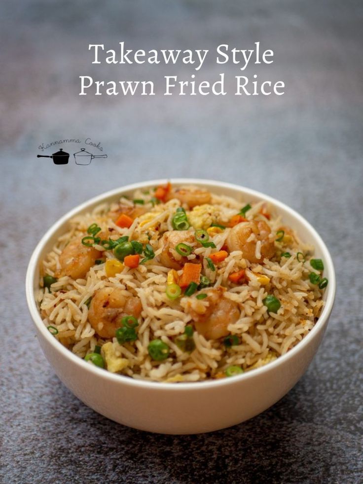 a bowl filled with rice and vegetables on top of a gray countertop next to the words takeaway style prawn fried rice