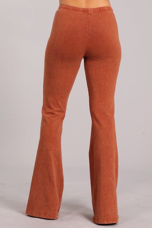 Experience luxury with our Chatoyant Mineral Wash Bell Bottoms! These pants have the appearance of mineral jeans, but the comfort of leggings and an elastic waist. Each one is uniquely hand-dyed, resulting in beautiful variations that add character. With an inseam of 33 inches and made in America with a blend of 93% cotton and 7% spandex, these pants are the epitome of premium quality. Perfect for resort wear, exude elegance and sophistication while staying comfortable and sexy. Check out all th Comfort Stretch Full Length Pants For Fall, Comfort Stretch Full-length Pants For Fall, Comfortable Full-length Bottoms For Fall, Comfortable Full Length Bottoms For Fall, Fall Straight Leg Yoga Pants With Elastic Waistband, Comfortable Fitted Yoga Pants For Fall, Versatile Stretch Bottoms For Fall, Trendy Fall Loungewear Yoga Pants, Versatile Straight Leg Yoga Pants For Fall