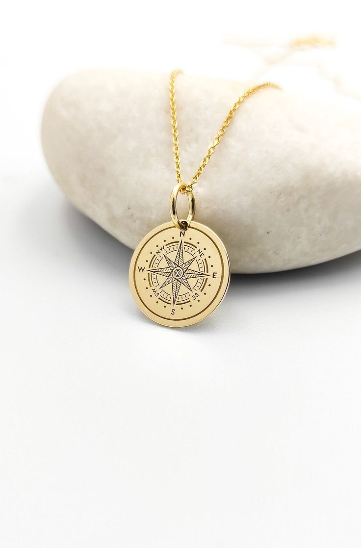 Welcome to RedGiftBox, it is our pleasure providing you our fine gold jewelry! Information about the pendant: - 14K Real Gold - 0.5mm Thick - Jumpring Diameter: 4mm Sizes Available: - 13mm / 0.52 inches - 15mm / 0.59 inches - 18mm / 0.70 inches - 20mm / 0.78 inches - 22mm / 0.86 inches - 24mm / 0.94 inches ▪️ We can engrave the back of your pendant with your custom personalized message, text, name or date for FREE! We recommend 5 lines with a maximum of 15 characters on each line. Information ab Symbolic Gold Jewelry With Compass Design, Symbolic Gold Necklaces With Compass Design, Gold Necklace With Compass Design For Anniversary, Gold Anniversary Necklace With Compass Design, Personalized Gold Jewelry For Travel, Anniversary Gold Necklace With Compass Design, Gold Medallion Jewelry For Travel, Gold Engraved Jewelry For Travel, Travel Engraved Gold Jewelry