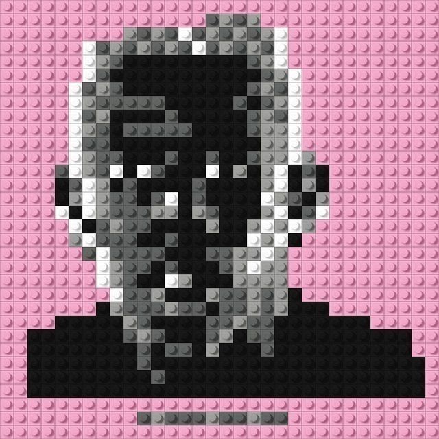 a pixellated image of a man's face in black and white on a pink background