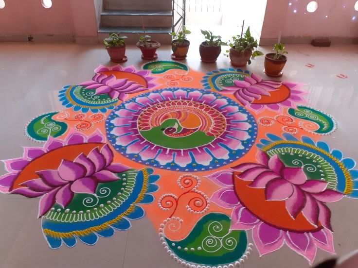 an artistically designed carpet with potted plants in the background