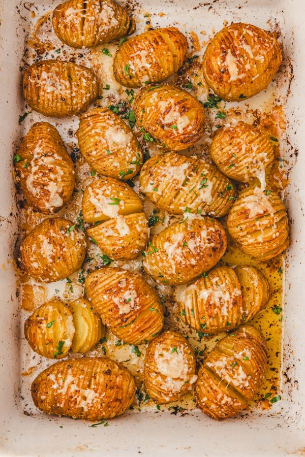 baked croissants in a baking dish with parmesan cheese