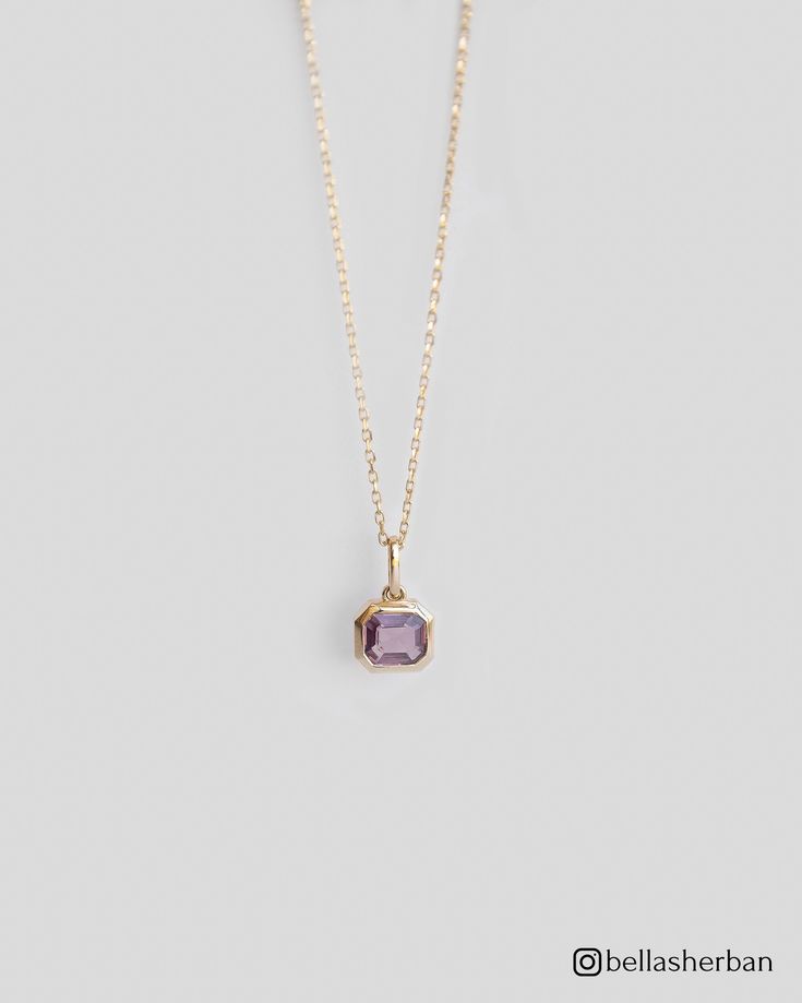 Immerse yourself in the captivating beauty of our 14K Solid Gold Purple Sapphire Necklace, a gentle solitaire pendant showcasing sophistication, and refinement.This 14K solid gold necklace includes a unique purple sapphire--a oneof a kind untreated gemstone celebrated for its captivating color and delicacy. The bezel setting adds a touch of modern elegance to this solitaire pendant, making it ideal for everyday use or as a showpiece for special occasions. This delicate solitaire necklace ensures that you have a genuinely unique piece that shows your style and appreciation for timeless elegance. Details:  * 14K Solid Gold * 0.63ct Natural Emerald-Cut Untreated Purple Sapphire  * Removable pendant  * Chain length: 40cm + 3cm (16" + 1.18") * Ready to ship in 14K yellow gold Processing time: T Dainty Solitaire Gemstone Necklace For Formal Occasions, 14k Gold Pendant Solitaire Necklace For Formal Occasions, Formal 14k Gold Birthstone Necklace With Gemstone, 14k Gold Birthstone Necklace With Gemstone For Formal Occasions, Formal 14k Gold Birthstone Necklace, Formal 14k Gold Pendant Birthstone Necklace, Delicate Solitaire Necklace With Birthstone For Formal Occasions, Formal 14k Gold Solitaire Pendant Necklace, Dainty Pendant Birthstone Necklace For Formal Occasions