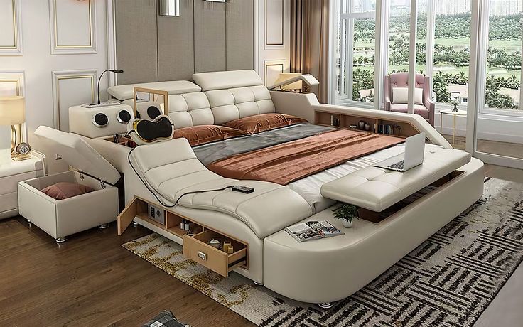 a large bed sitting in the middle of a living room