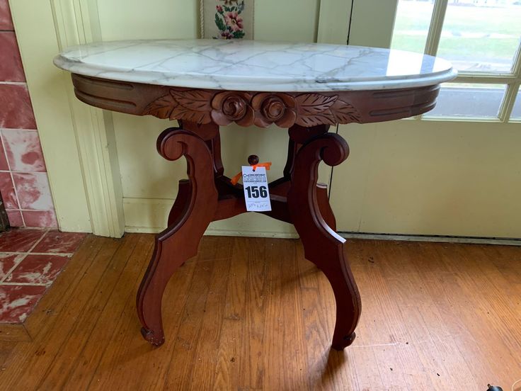 a small table with a price tag on it