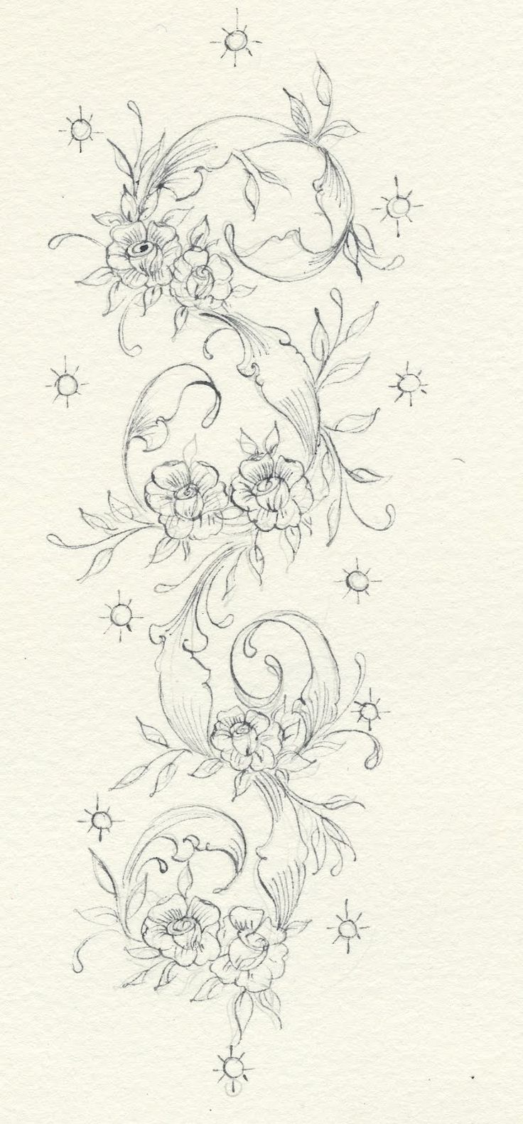 a drawing of flowers and stars on paper